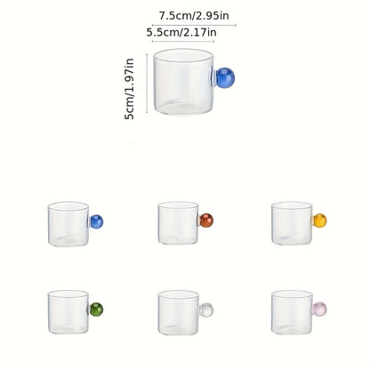 6-piece set of chic Italian-style mini glass pitchers with colorful knobs, perfect for juices, sauces, and frothy drinks. Handwash only.