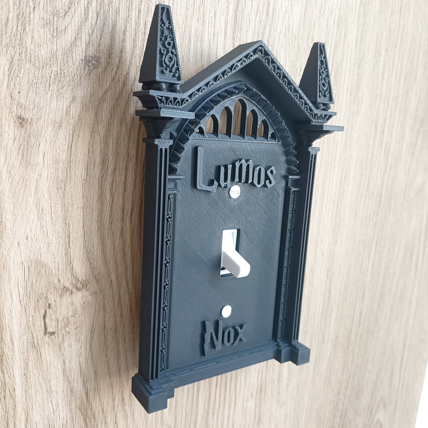 Easy-install 3D printed light switch cover for Halloween and holiday decor; no batteries needed. Unique black wall art for home, Halloween decorations.