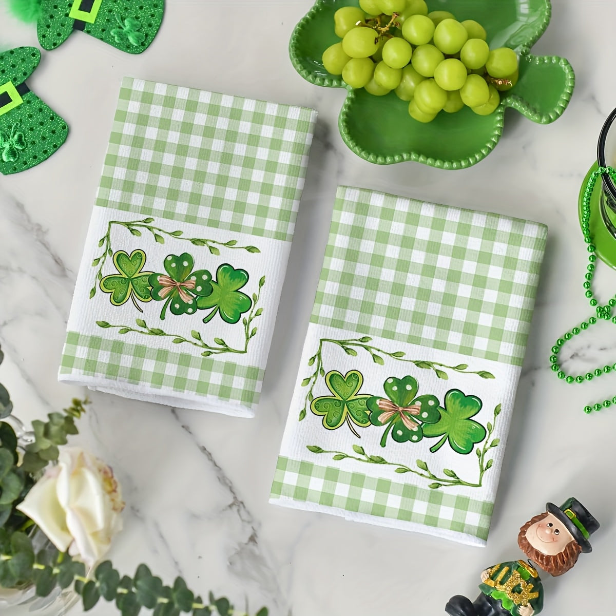 Two Buffalo Check Clover Kitchen Towels perfect for St. Patrick's Day festivities, sized at 40.64X60.96 cm. These Farmhouse-inspired hand towels add a touch of festive decor to your home.