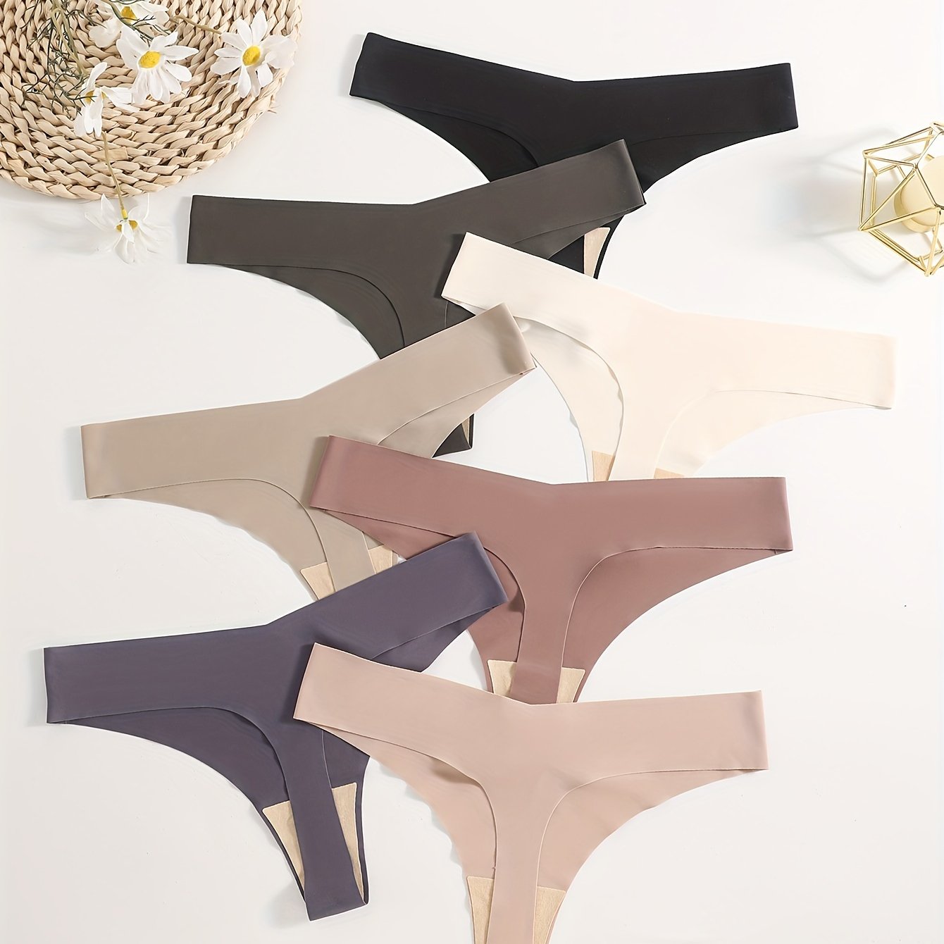 7 seamless solid thongs for women, soft and comfy intimates.