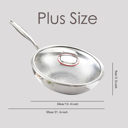 Pure Cook presents the 31.75/33.78cm Titanium-Coated Wok with Lid, featuring Hammered Tri-Ply Stainless Steel. This wok is free from PFOA and PTFE, making it safe for use in dishwashers and ovens.