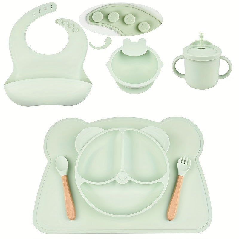 7-piece toddler meal set with silicone utensils in mixed colors, featuring cartoon design and high suction power. Easy to clean and includes placemat, plate, bowl, spoon, fork, bib, and