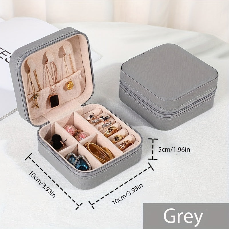 One stylish and portable jewelry box for earrings, rings, and necklaces.