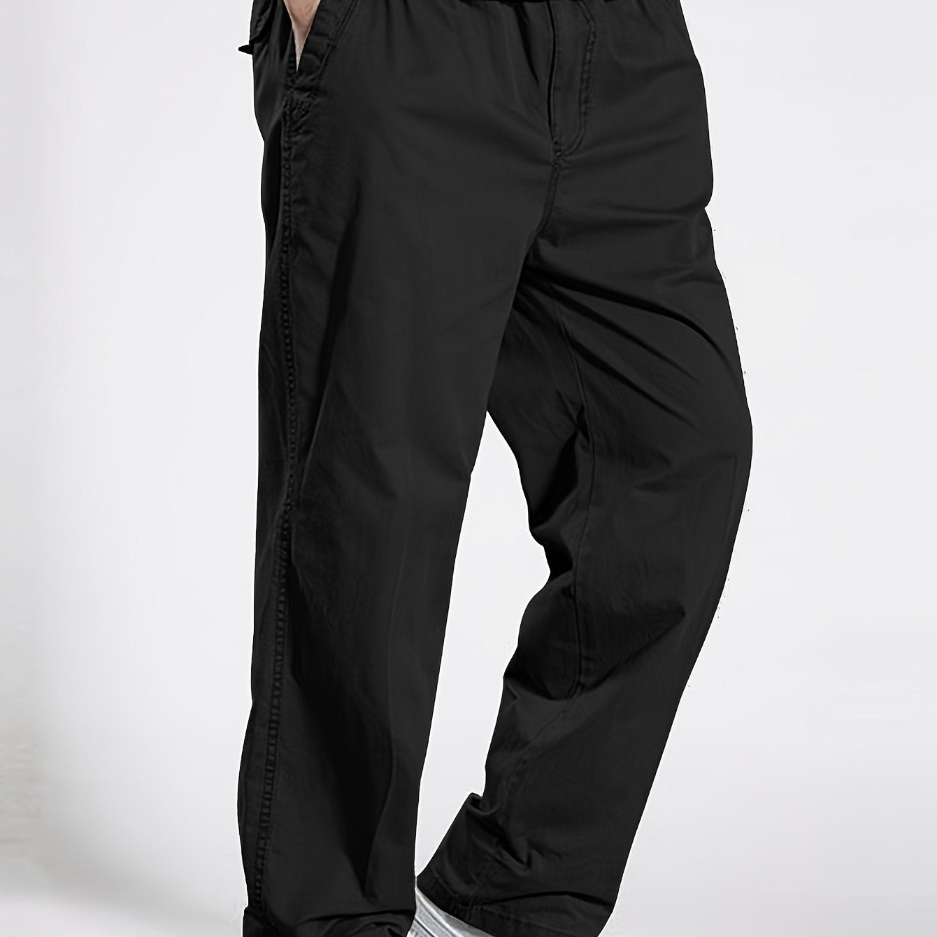 Classic Men's cargo pants with elastic drawstring waist in solid color for Spring/Fall comfort.