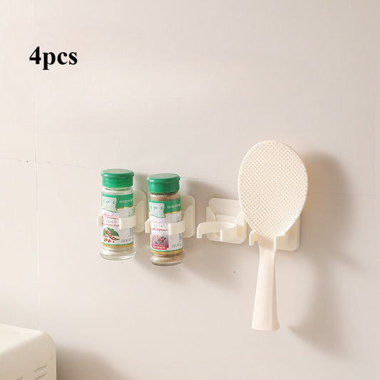 Self-adhesive storage rack for organizing seasonings, spoon holders, and household seasoning storage boxes. Comes in a set of 4.