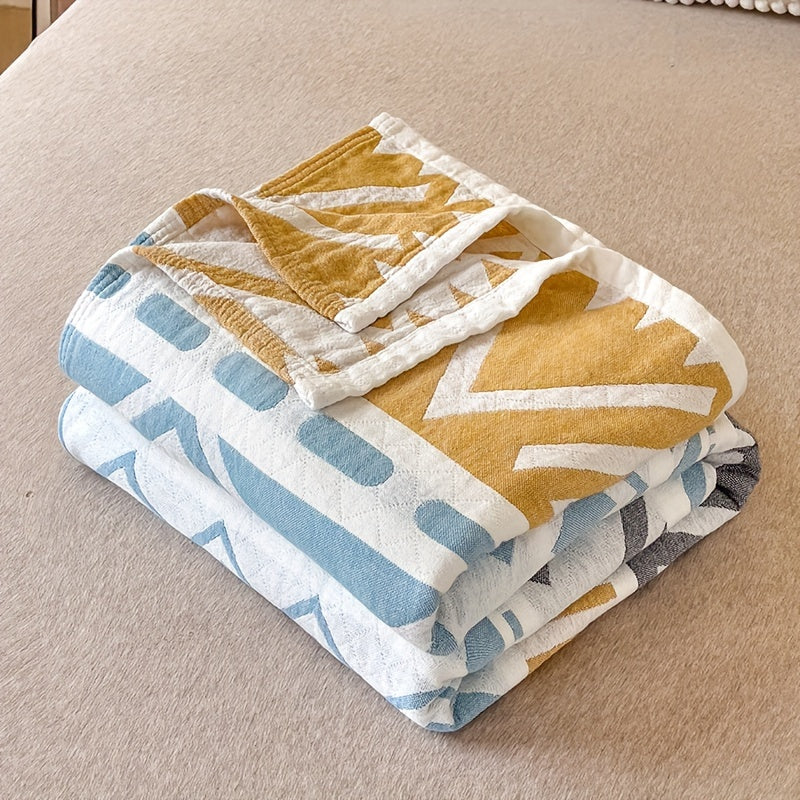 High-Quality Boho Checkered Lightweight Quilt made of 100% cotton with a 40s thread count. Features a neutral grey and white plaid design suitable for modern farmhouse and bohemian