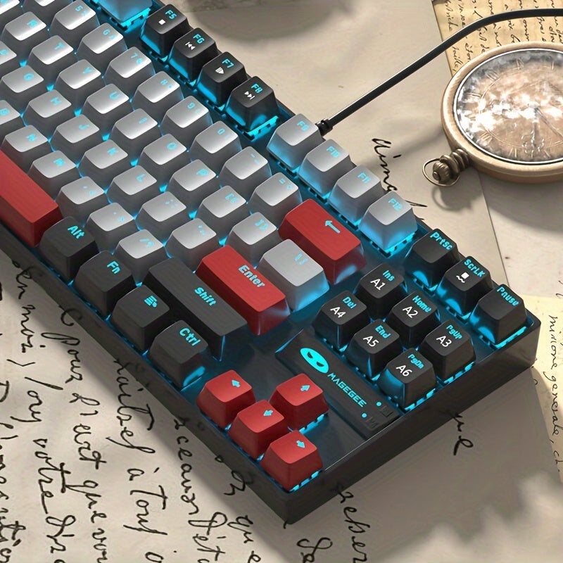 MageGee MK-STAR Mechanical Keyboard: 87-Key Wired Backlit, Ergonomic Design, USB, Black & Blue, No Battery Needed, Keycap Puller Accessory.