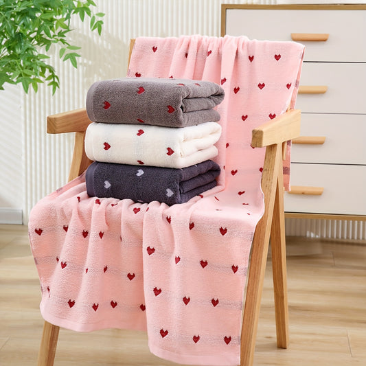 Heart pattern cotton bath towel, absorbent and quick-drying, soft and thick for home bathroom use. Ideal bathroom supply.