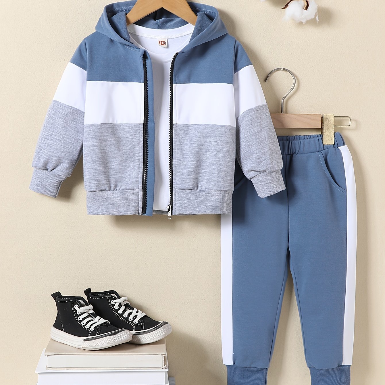 Affordable boys' hoodie and pants set with colorful design.