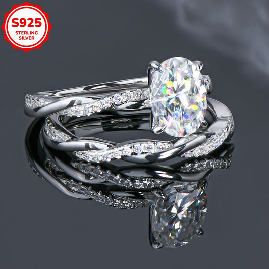 Weight: 5.48 grams, Main Stone: Oval 7x9mm Moissanite, Main Stone Weight: 2 carats, Set of 925 Pure Silver Women's Rings featuring a Moissanite main stone. The set includes a Moissanite Wedding Ring, Women's Wedding Ring, Engagement Ring with a twist arm