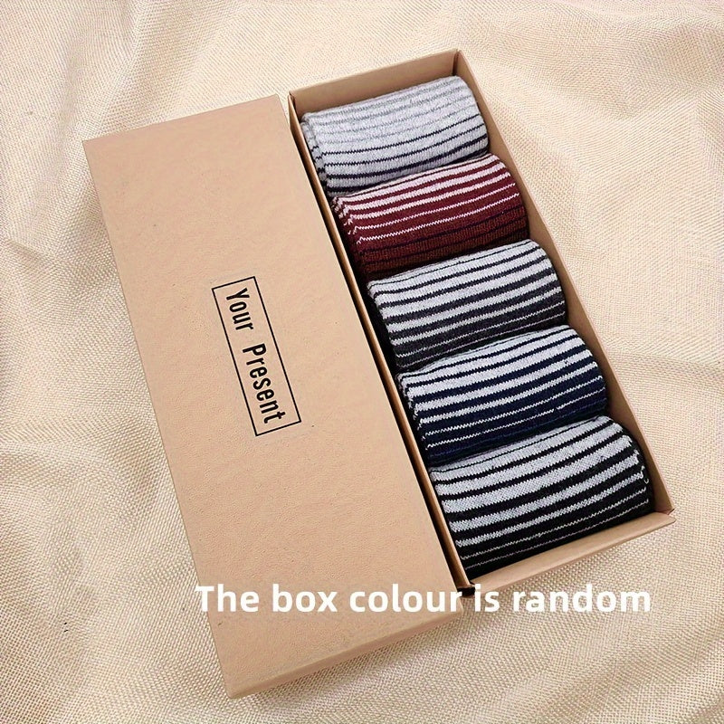 5 pairs of men's warm and comfortable wool socks, boxed for gifting.