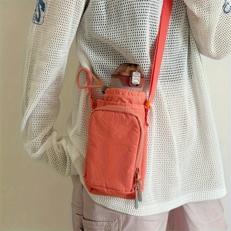 Nylon crossbody bag with water bottle and phone pockets, available in 5 colors, with zip closure.