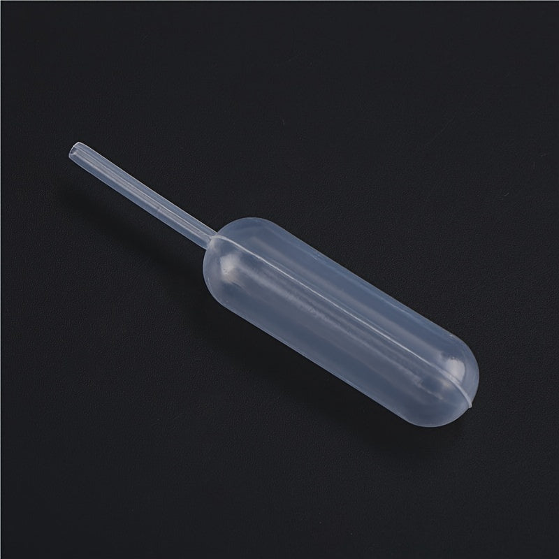 100 round plastic squeeze bottles, each with a 4ML transfer pipette for cupcake decorating. Hand wash only. Does not contain BPS material.