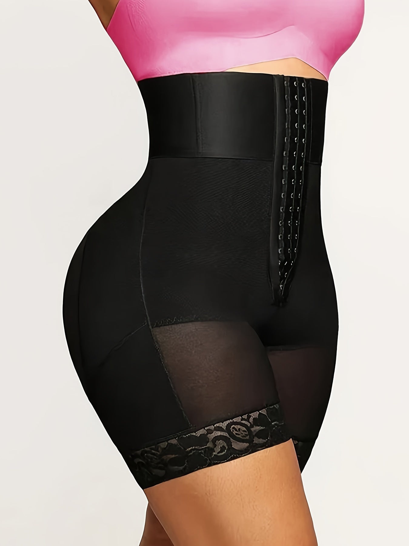 High waist shapewear shorts made of 77% nylon and 23% spandex knit fabric, featuring a solid color with contrast lace detail. Includes an adjustable waistband and weighs 235-237 g/m².