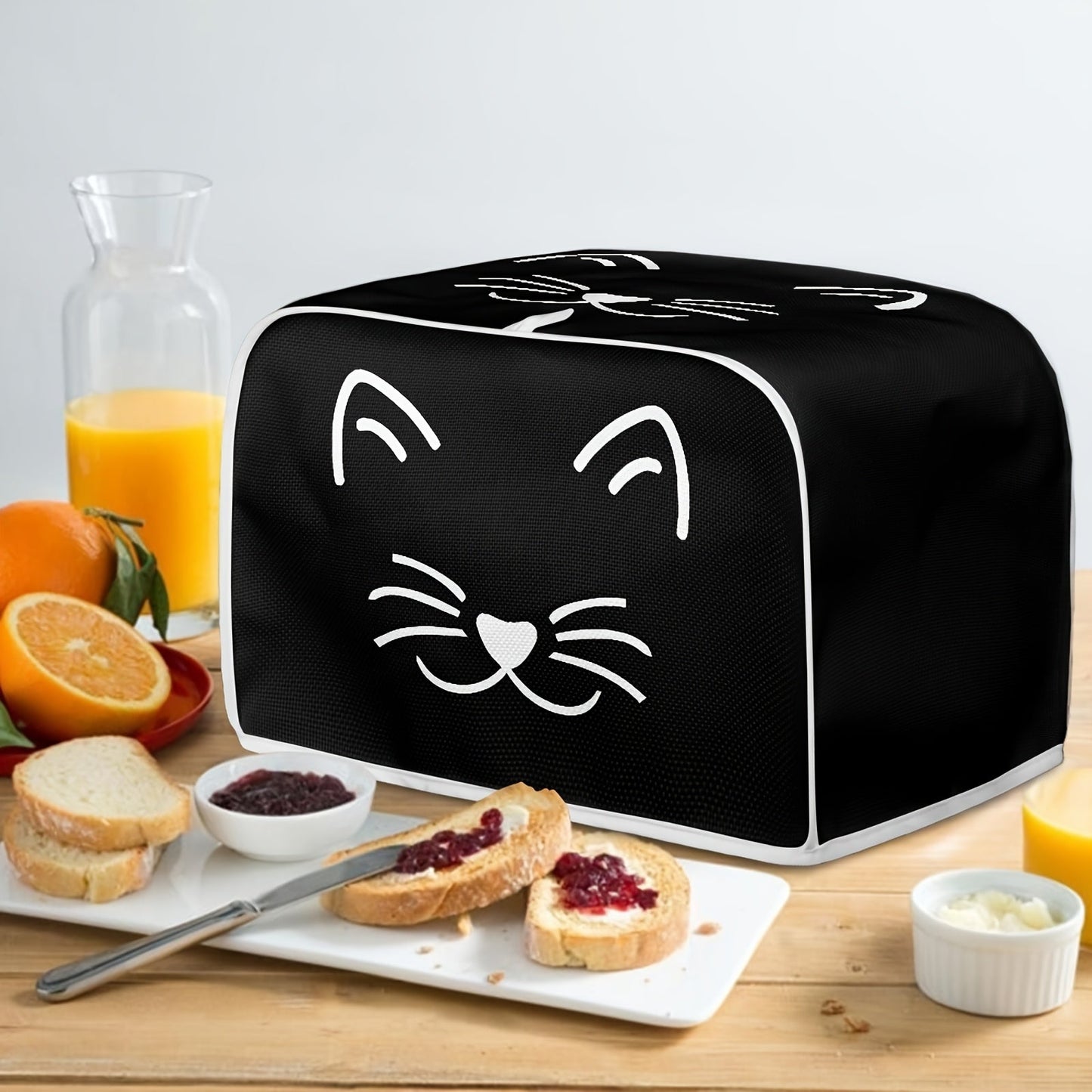 Give the gift of quality with this classic cat print toaster cover. It features 2 wide slots and is dustproof, anti-fingerprint, and anti-oil. This universal kitchen appliance cover is machine washable and perfect for protecting your small appliances and