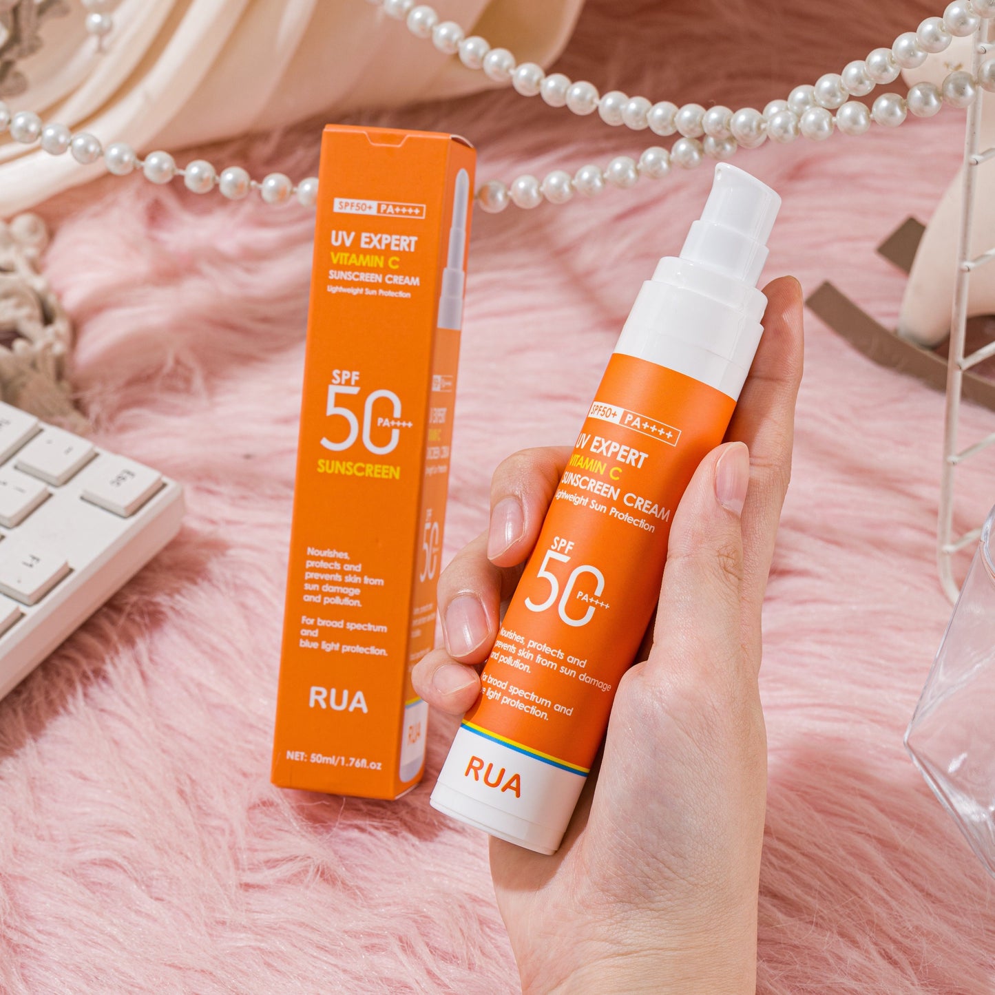 Non-greasy Vitamin C sunscreen for face and body, ideal for outdoor activities on sunny days.