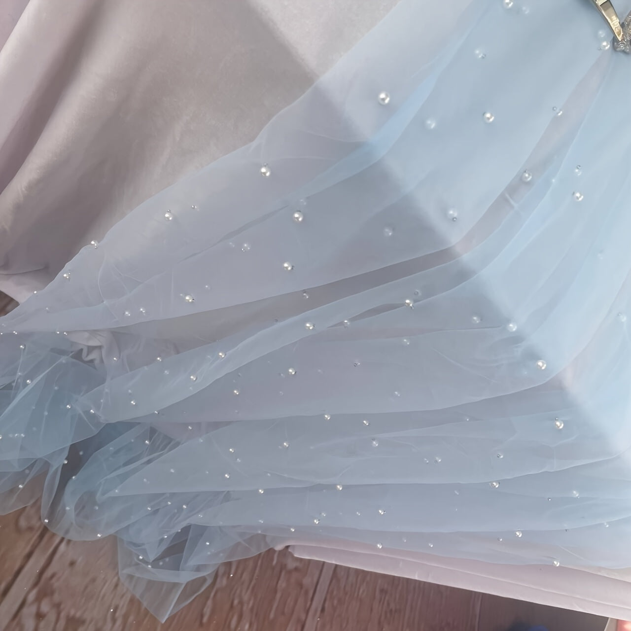 Elegant pearl bead tulle table runner, perfect for weddings and parties. Can also be used as a chair sash or backdrop drape. Made from 100% polyester fabric with delicate bead detailing.