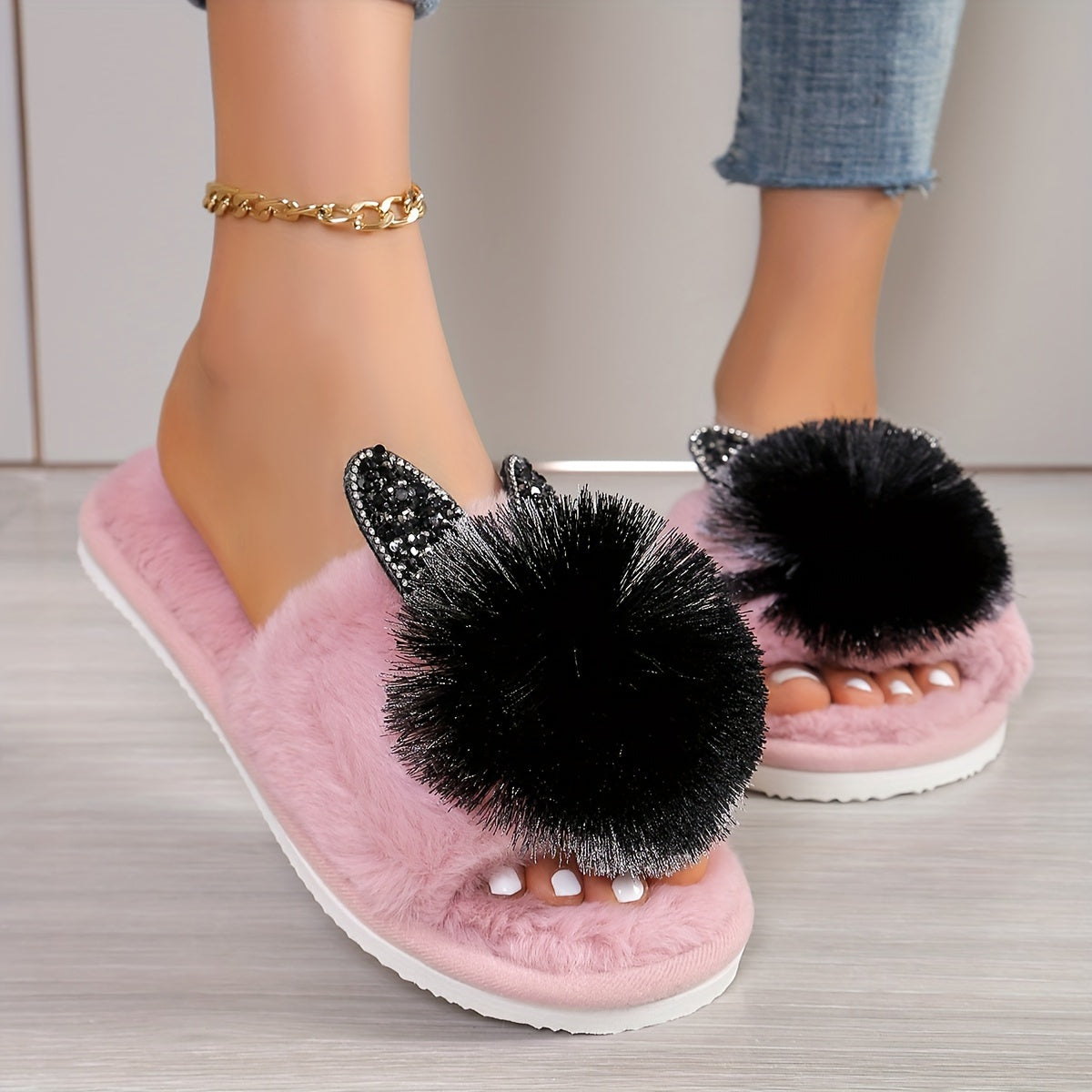 Adorable gray bow slippers with fluffy black accents, EVA sole, all-season comfort, and machine washable