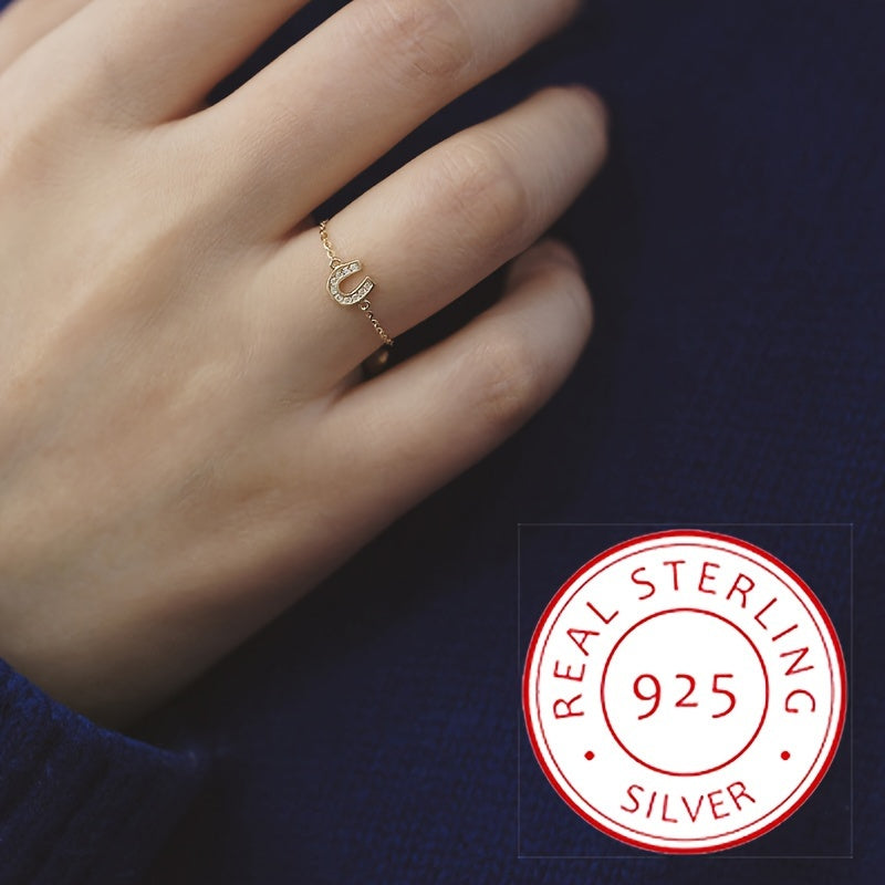 Adjustable open ring made of 925 sterling silver adorned with a moon and flower charm, perfect for women who love elegant and unique fashion jewelry. Weighing in at 2.3 grams, this stunning piece features a pull chain for easy adjustment and can be worn