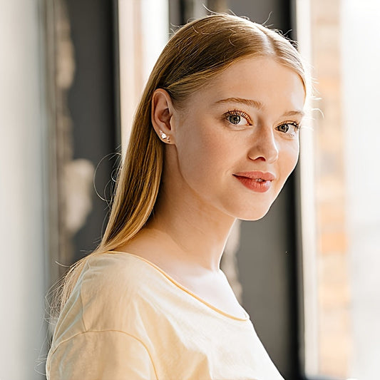 Fashionable women's piercing jewelry featuring 6 hypoallergenic spiral cartilage earrings made of 316L stainless steel, adorned with square crystal zirconia.