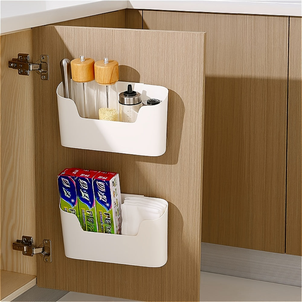 Plastic holder for bags and film with hooks, suitable for home, kitchen, and restaurant. This wall-mounted cabinet door storage organizer is ideal for keeping your kitchen organized.