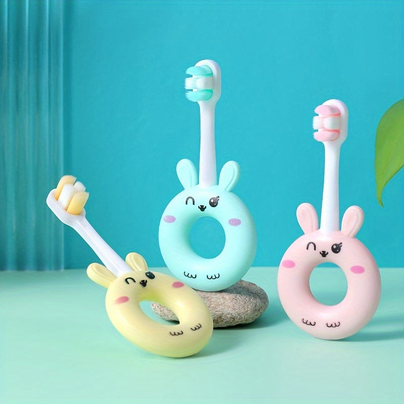 Gentle silicone baby toothbrush for toddlers aged 0-3. Features cute cartoon design and super soft bristles for gentle cleaning on sensitive teeth.