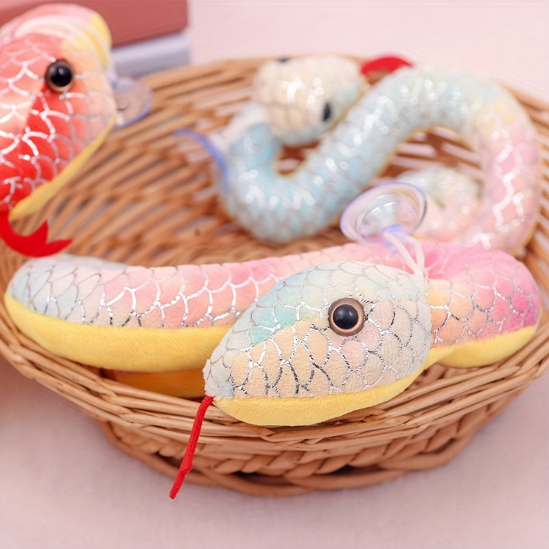 Soft cotton plush pendants in tie-dyed and gilded snake designs, perfect for celebrating the Year of The Snake. Suitable for ages 14 and up.