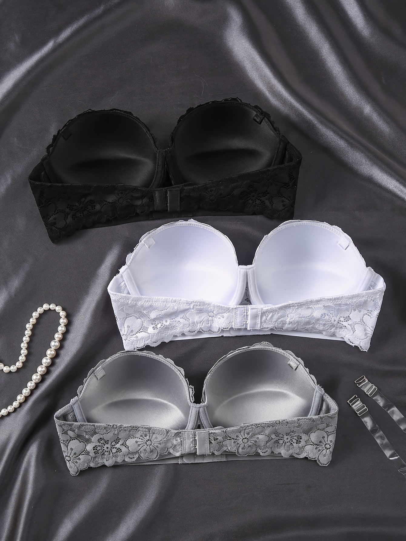 3 Elegant Lace Strapless Bras for Women in White, Gray, and Black - Front Closure, Push-Up Balconette Style with Non-Removable Pads, Breathable & Comfortable.