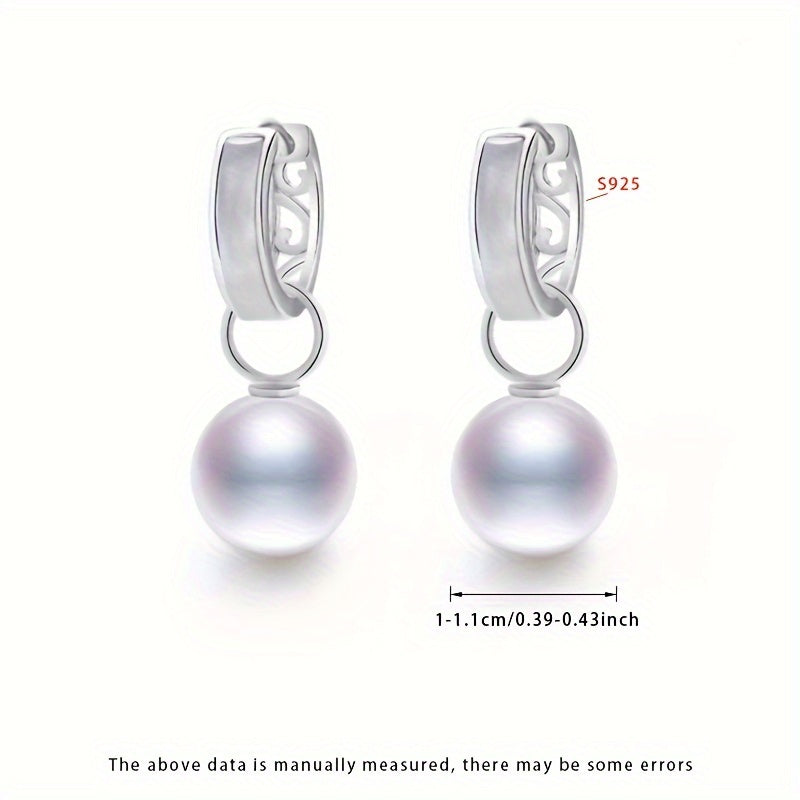 A Pair of Pearl Earrings in a Gift Box - A Must-Have Gift for Women. These fashionable hoop earrings are made of S925 Silver with 10-11mm round natural freshwater pearls. The pearls are removable and add a graceful touch to any outfit. Please note that