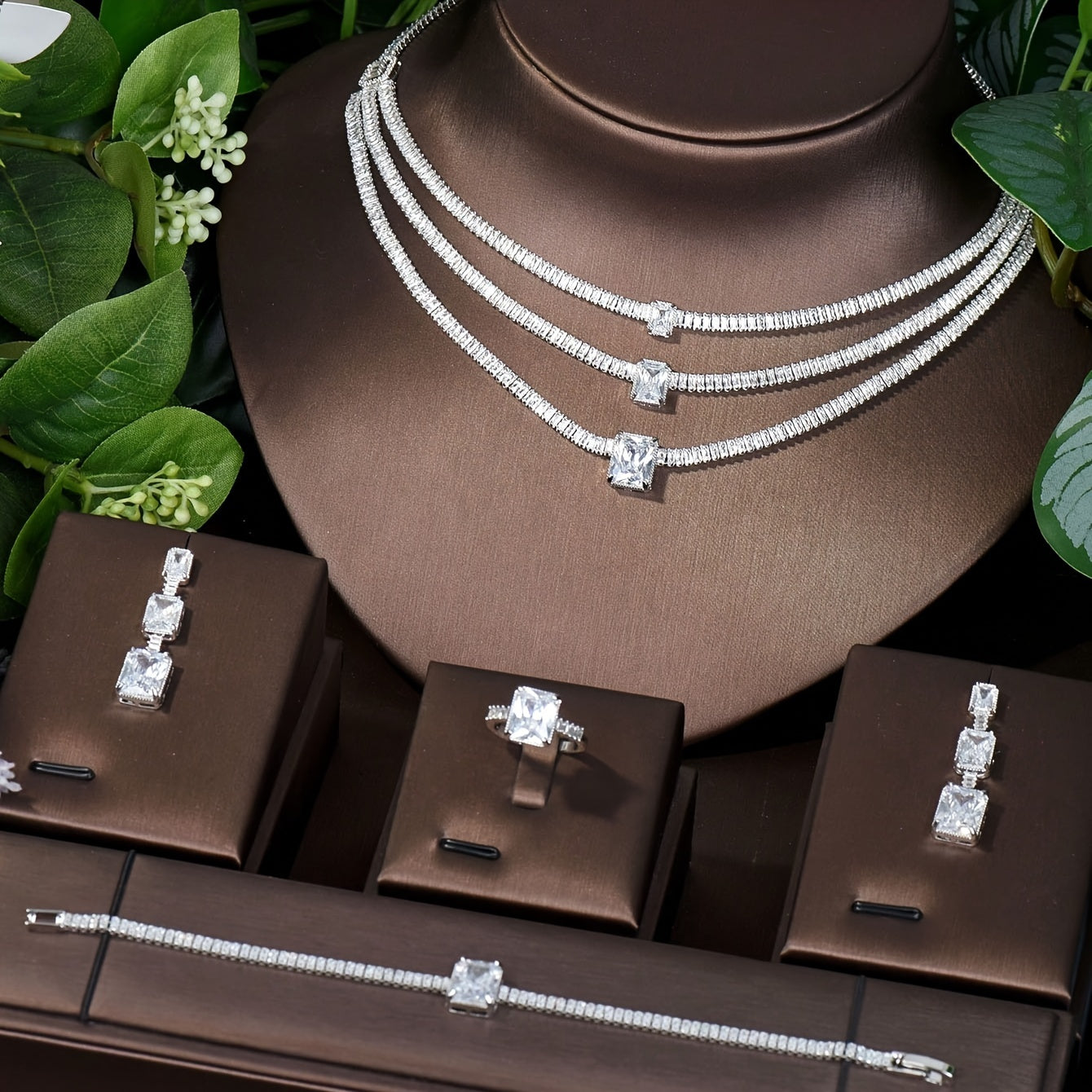 Luxurious Bridal Jewelry Set featuring Multi-Layer Sparkling Square Zirconia, 18k Gold Plating, and Necklace, Earrings, Ring, and Bracelet. Perfect for Women on their Wedding Day or Special Occasion.