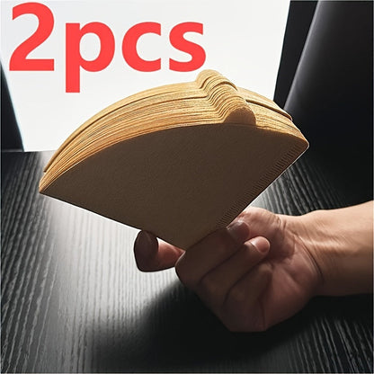 1 set of 2 coffee filter paper packets, made from 100% wooden pulp. These conical hand-pouring filter cups are designed for use in drip-style American coffee pots. Each set includes 200 filter papers.