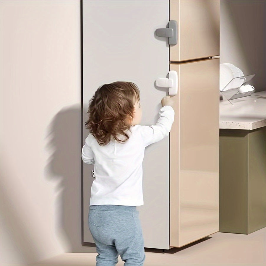 Safety latch for refrigerator door designed specifically for young children - made from non-toxic plastic for a secure, child-proof closure.