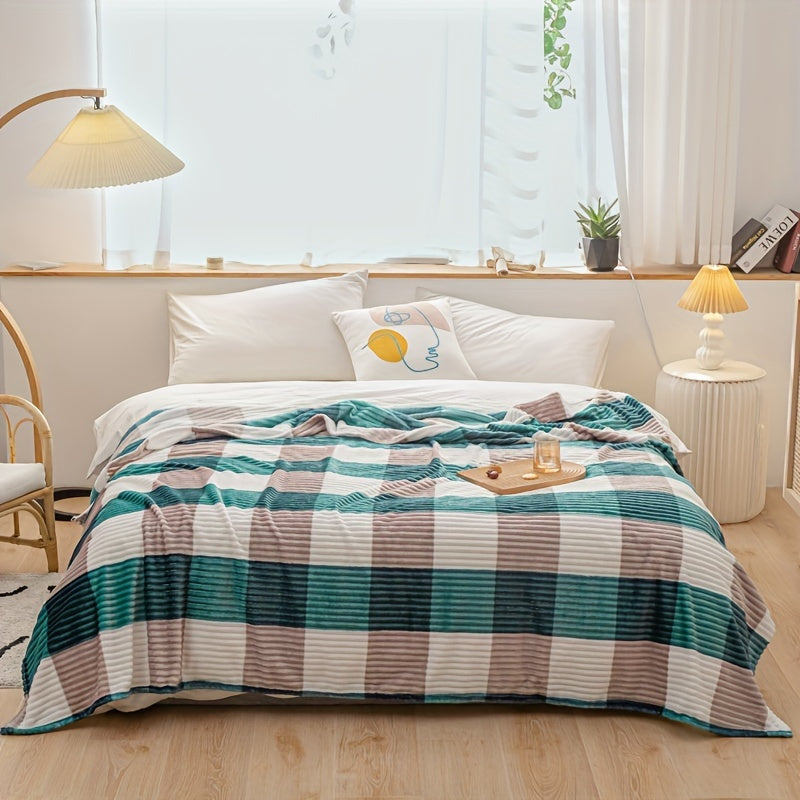 A cozy fleece blanket with whimsical stripes, ideal for snuggling up at work or having a quick snooze.