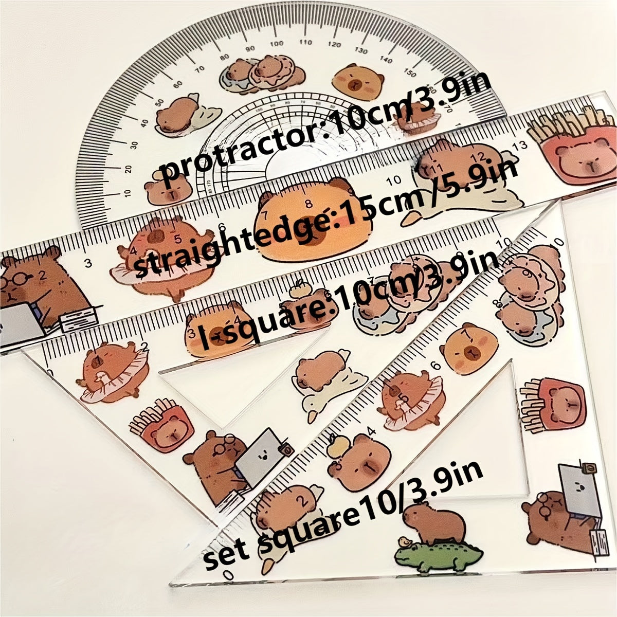 One set of 4 plastic transparent Capybara-themed rulers for drawing tests, including a triangle ruler board. Cute kawaii stationery for school supplies.