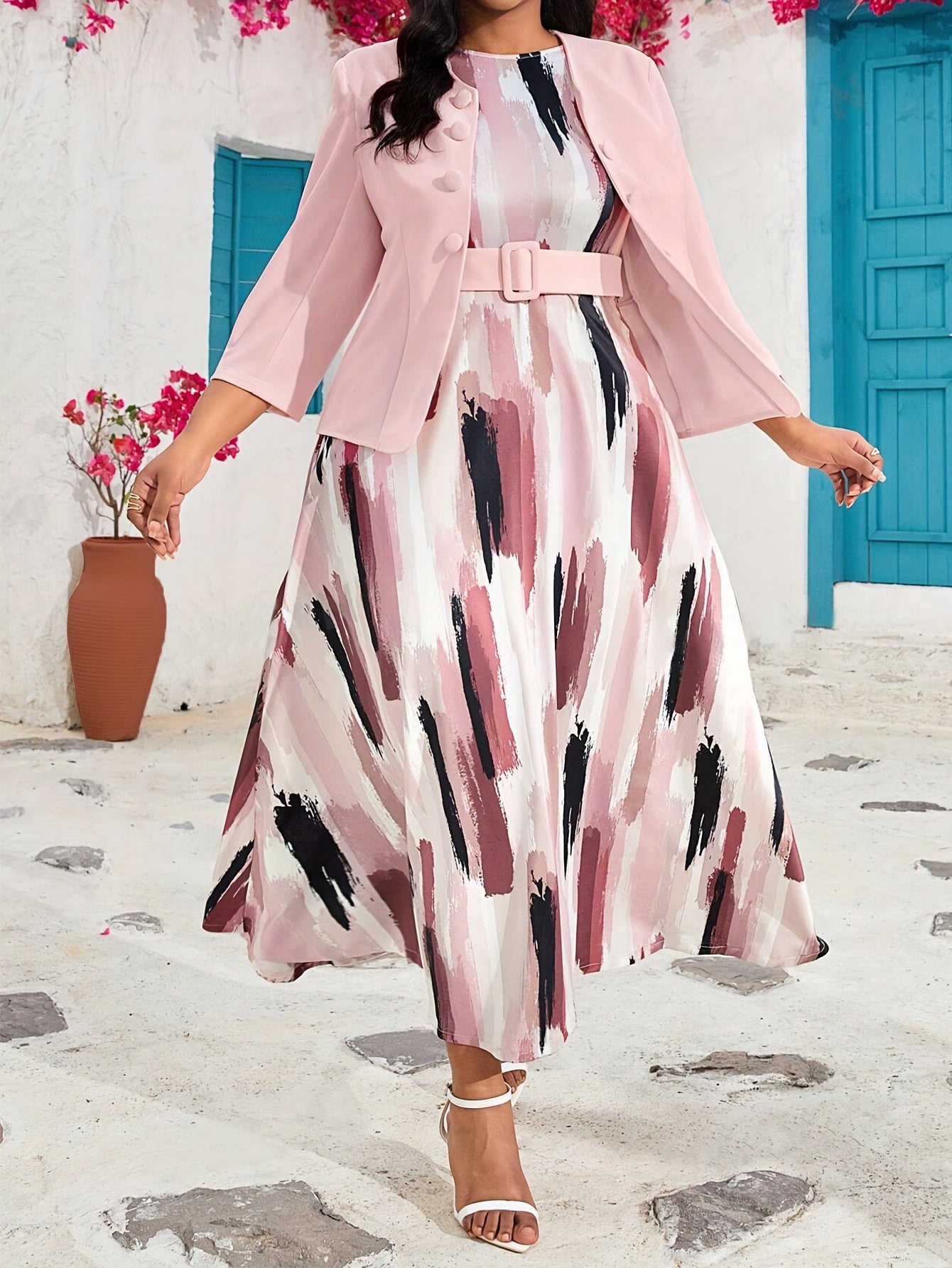 Stylish pink coat and vest dress set for plus-size women that enhances the figure.