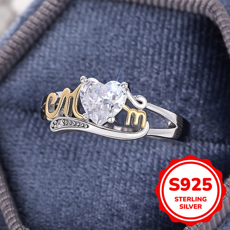 Heart-shaped zirconia ring in sterling silver with MOM lettering, featuring a 4-prong setting in a vintage sexy style. Perfect for all seasons, this ring makes a great Mother's Day gift. It also includes a synthetic gemstone representing April's