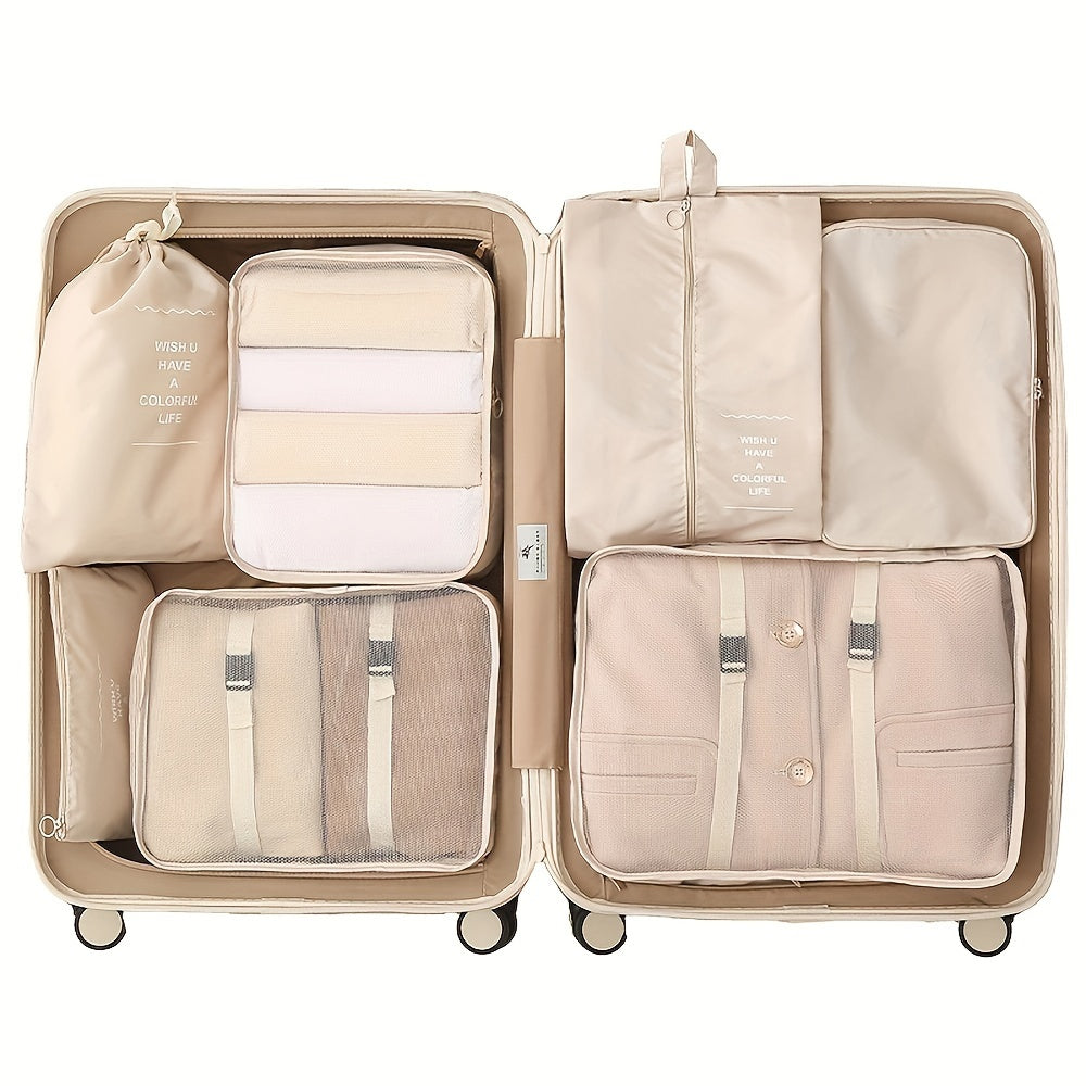 Waterproof travel organizer bag, includes seven pieces for clothes, pants, shoes, and socks.