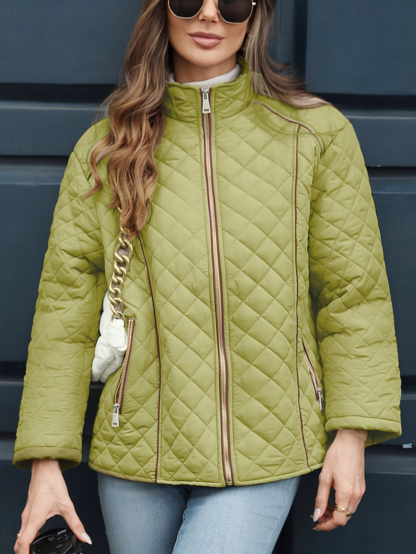 Women's plus size casual quilted outerwear with stand collar, zipper, and long sleeves. Made of 100% non-stretch solid woven polyester for fall/winter.