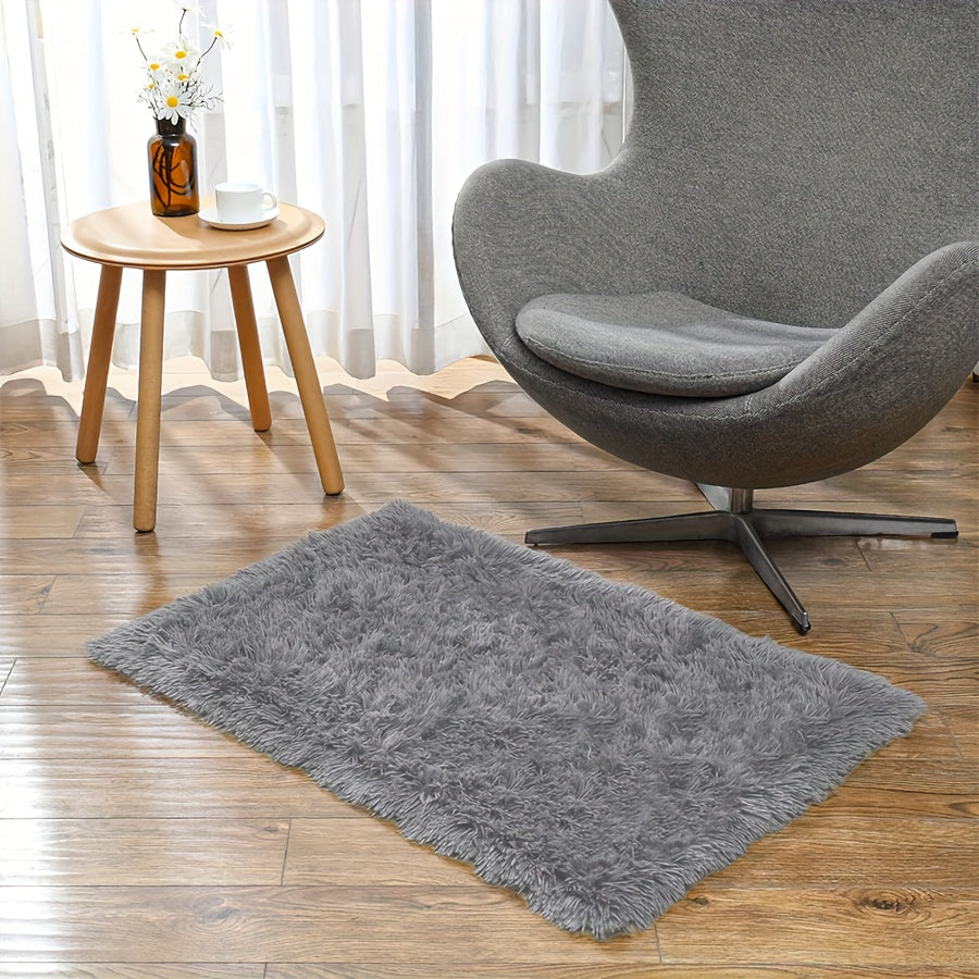 High-end quality Ultra-Soft Plush Faux Fur Area Rug with Tie-Dye Design is perfect for adding a touch of warmth and style to your living room, bedroom, or sunroom decor. This non-slip and durable rug is made of ponge and is suitable for most families.