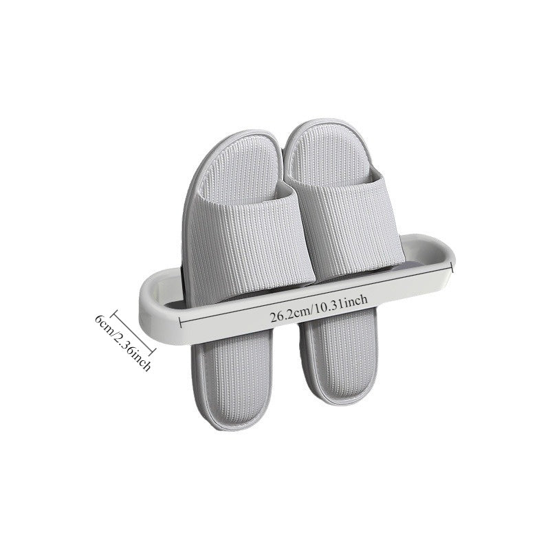 Wall-mounted bathroom slipper rack for 1 pair of shoes, designed without the need for perforation. This storage rack can hold single and double shoes, and is perfect for organizing your bathroom space.