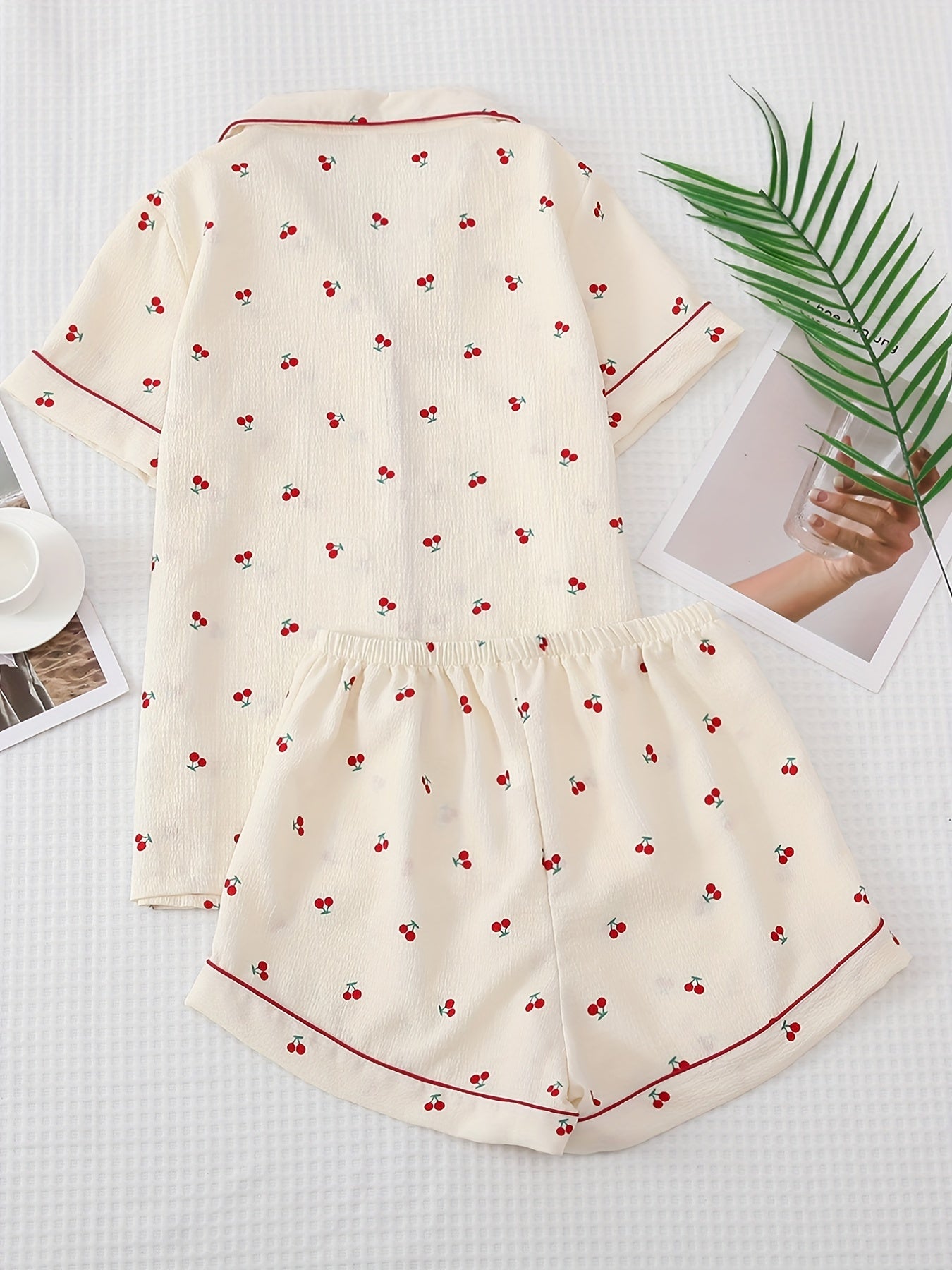 Cherry print pajama set featuring lapel button top and bow shorts, perfect for women's sleepwear and loungewear.