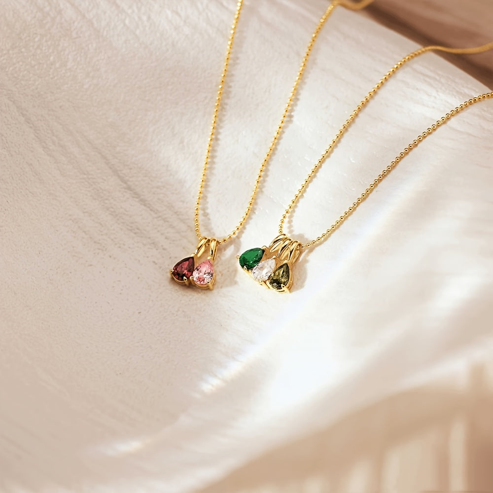 Customize your own Birthstone Necklace with up to five birthstones, plated in 18K gold. Enter the month in Arabic numerals for a personalized touch. This necklace makes a perfect gift for her, mom, or girlfriend for Christmas, Valentine's Day, or an