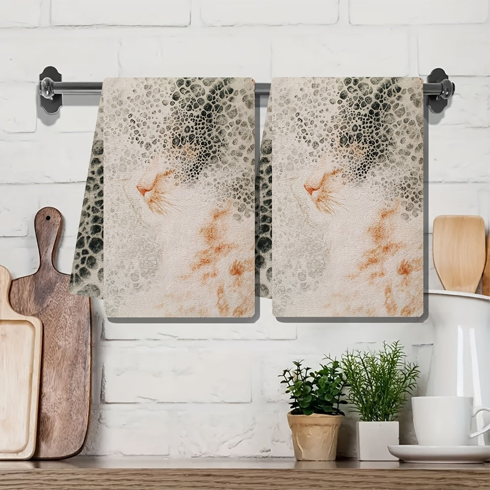 Upgrade your kitchen with this set of two ultra-soft hand towels featuring a charming kitten spot pattern. These towels are highly absorbent and machine washable, making them perfect for everyday use. Measuring 40.64x60.96 cm, they are also ideal for