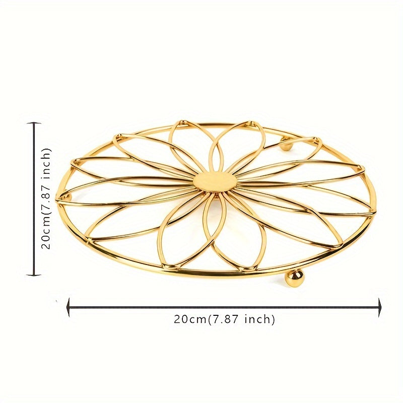 This stylish trivet features a decorative hollow flower design and is made of durable stainless steel. It is heat-resistant and non-slip, making it the perfect accessory for your dining and kitchen countertops. Ideal for Halloween and Christmas parties