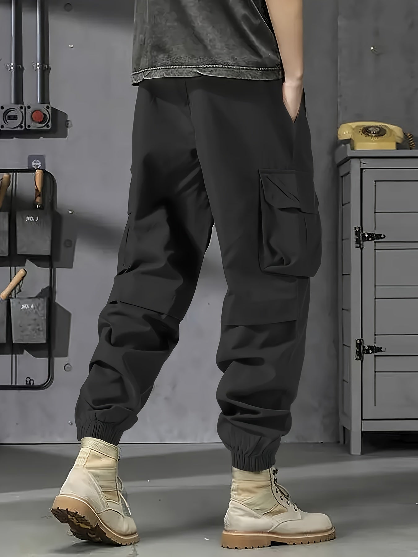 Durable polyester cargo pants with multiple pockets for outdoor work and casual wear in plus sizes.