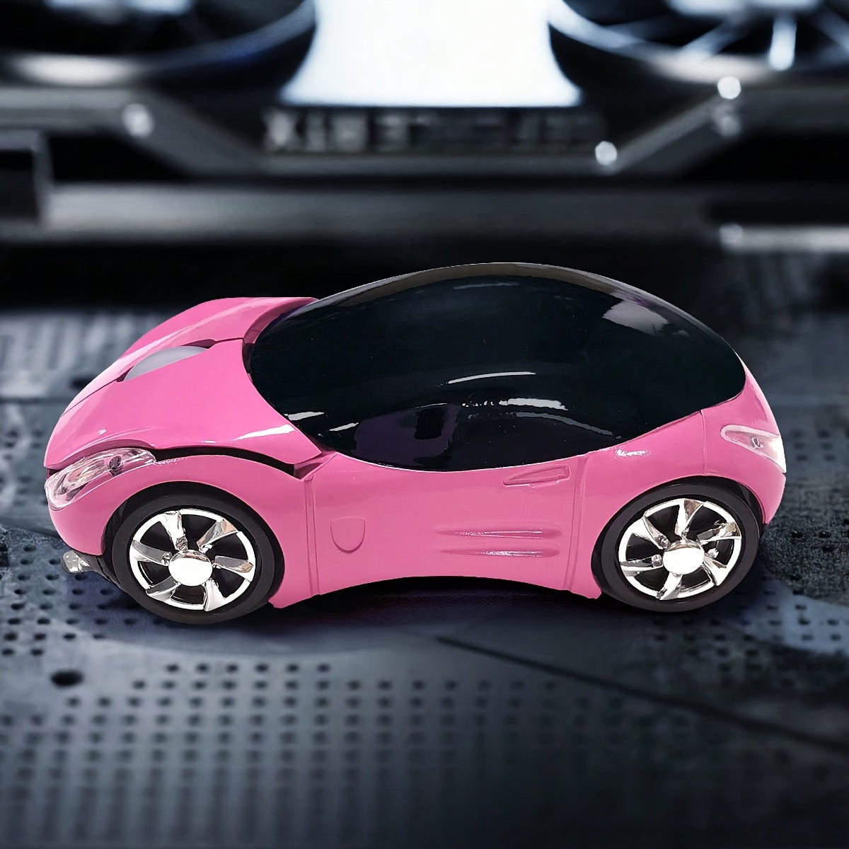 Wireless car-shaped gaming mouse with USB 2.4G receiver, silent ergonomic design, adjustable wrist support, pink with black wheels, battery powered, non-rechargeable.