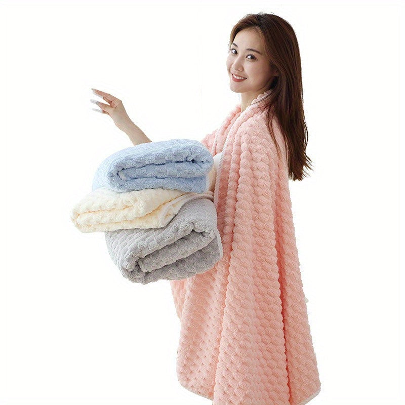 Large pink coral fleece bath towel that is ultra-soft, absorbent, lint-free, and stylish. Perfect for a cozy post-shower experience.