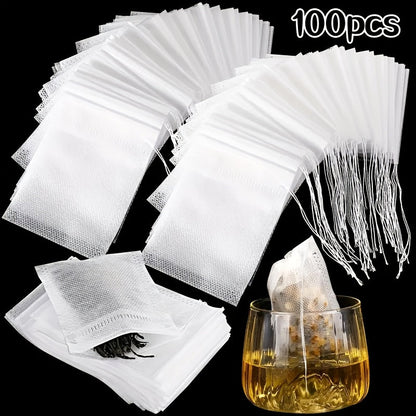 Pack of 100 Premium Disposable Tea Bags - Clear Non-Woven Fabric with Drawstring Closure, Great for Convenient Brewing - Suitable for Home & Business Use, Comes with Extra Scented Tea Leaves