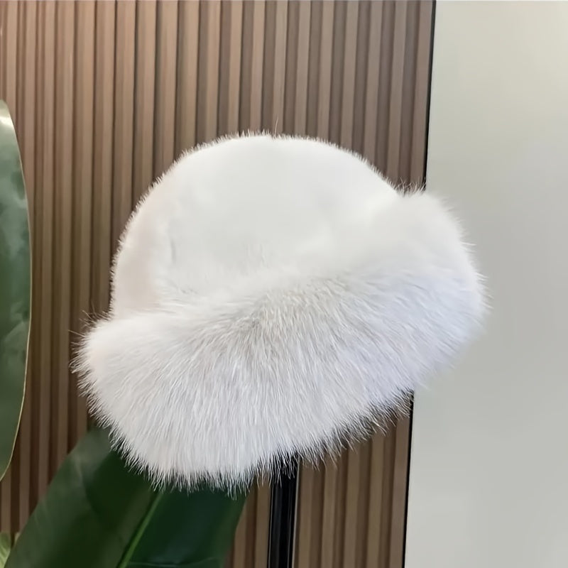 Luxurious LuxeFur Women's Faux Fur Winter Hat. Made of polyester fiber, this hat is lightweight and machine washable, making it a practical urban style accessory.