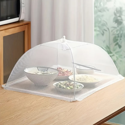 Lace mesh food cover that pops up like an umbrella to protect food from dust, reusable and collapsible design for table, kitchen utensil.